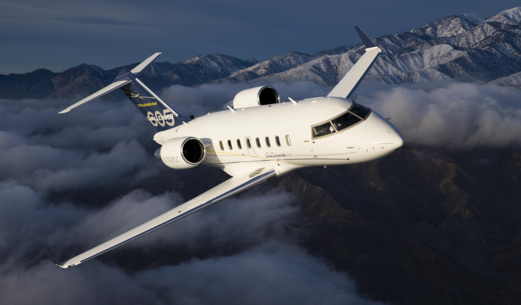 An aircraft in the sky, representing the curated collection of private jets for sale from Vertical Jet Sales.